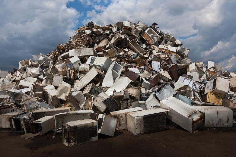 gizIMAGE_old- defunct-refrigerators-pile-up