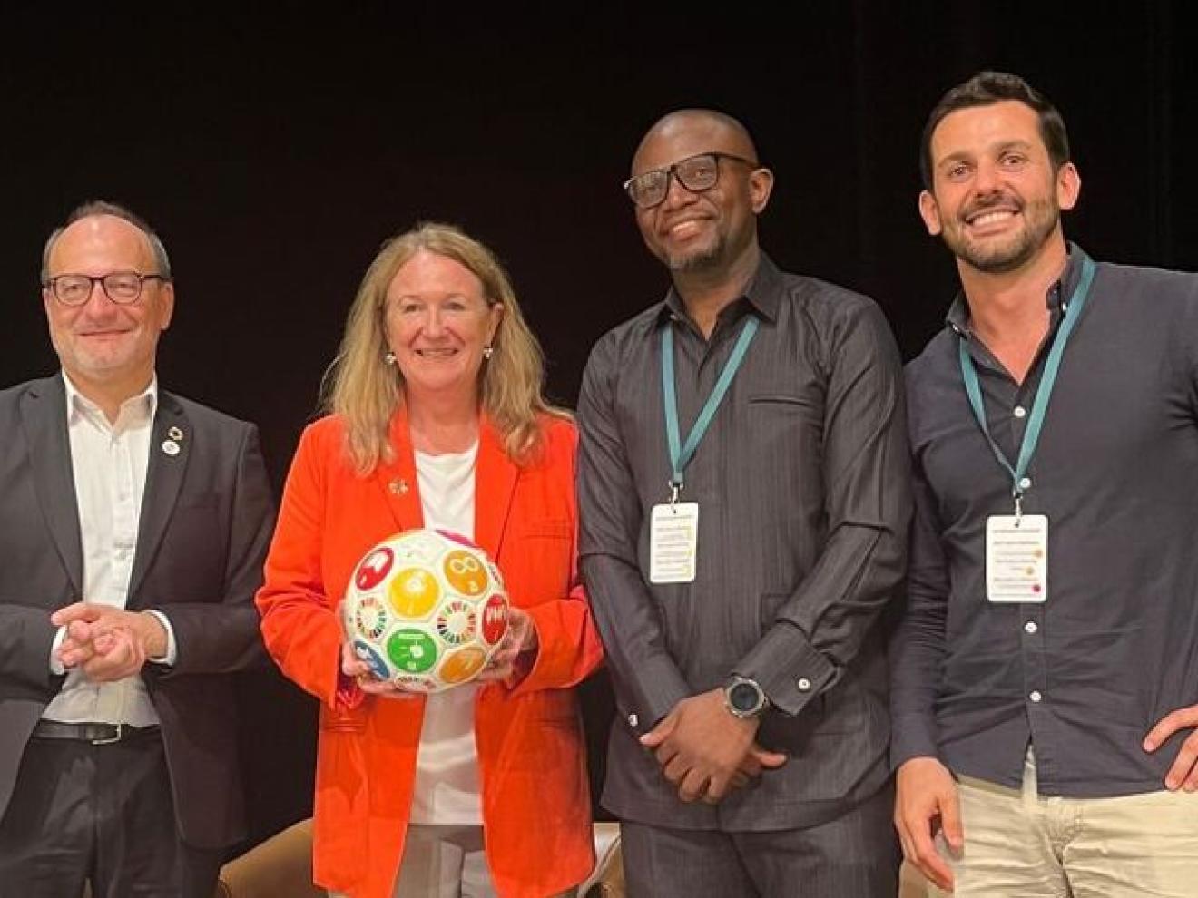 Gruppenbild vom Panel Sport für Entwicklung mit Rémy Rious (AFD), Ingrid Gabriela Hoven (GIZ), Dr. Decius Chipande und Yoan Noguier.