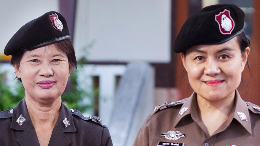 Two women in police uniforms